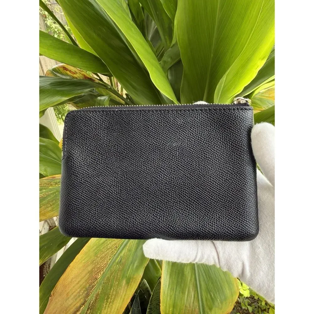 Coach corner zip